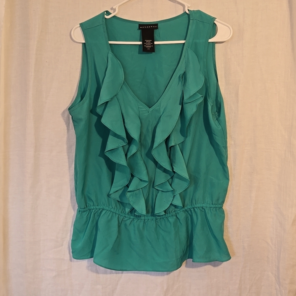Metaphor greenish blue blouse‎